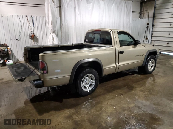 2002 Dodge Dakota with VIN 1B7FL16X82S590323, listed as a Copart auction lot 85287884 with 61,722 mi miles and Salvage Title. Bid and sale history available at carsss.com. Image 3.