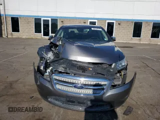 2011 Ford Taurus Limited z VIN 1FAHP2FW3BG146981, wystawiony jako Copart lot #58124275 z przebiegiem 64 163 mil mil oraz Szkoda całkowita • Salvage title. Historia ofert i sprzedaży dostępna na DreamBid. Obrazek 5.