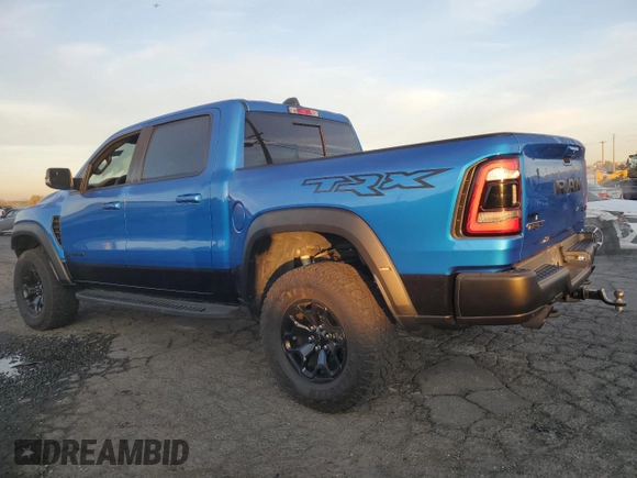 2021 Ram 1500 TRX with VIN 1C6SRFU98MN757772, listed as a Copart auction lot 49923465 with 27,250 mi miles and Salvage Title. Bid and sale history available at carsss.com. Image 2.