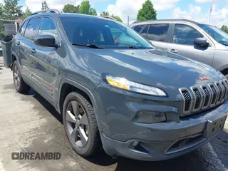 2016 Jeep Cherokee Latitude z VIN 1C4PJLCBXGW284156, wystawiony jako IAAI lot #42264152 z przebiegiem 117 327 mil mil oraz . Historia ofert i sprzedaży dostępna na DreamBid. Obrazek 1.