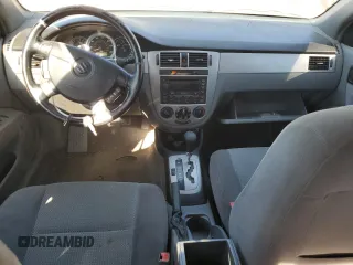 2006 Suzuki Forenza Premium z VIN KL5JJ56Z36K268290, wystawiony jako Copart lot #88509495 z przebiegiem 199 303 mil mil oraz Szkody całkowita. Historia ofert i sprzedaży dostępna na DreamBid. Obrazek 8.