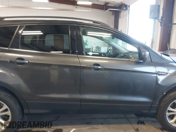 2018 Ford Escape SE with VIN 1FMCU9GD1JUC36452, listed as a IAAI auction lot 41964531 with 89,457 mi miles. Bid and sale history available at carsss.com. Image 14.