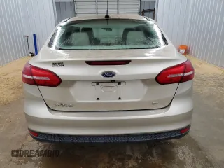 2018 Ford Focus SE z VIN 1FADP3F29JL265030, wystawiony jako Copart lot #54450665 z przebiegiem 152 165 mil mil oraz Czysty tytuł • Clean title. Historia ofert i sprzedaży dostępna na DreamBid. Obrazek 6.