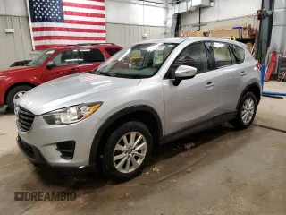 2016 Mazda CX-5 Sport z VIN JM3KE4BY2G0758248, wystawiony jako Copart lot #55595505 z przebiegiem 104 595 mil mil oraz Czysty tytuł • Clean title. Historia ofert i sprzedaży dostępna na DreamBid. Obrazek 1.