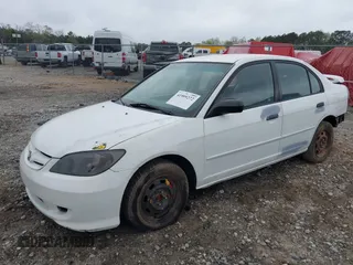 2004 Honda Civic VP with VIN 2HGES16334H611425, listed as a IAAI auction lot 41909272 with 196,304 mi miles. Bid and sale history available at carsss.com. Image 17.