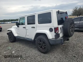 2018 Jeep Wrangler Unlimited Sahara with VIN 1C4BJWEG2JL851277, listed as a Copart auction lot 63631645 with 83,851 mi miles and Salvage title. Bid and sale history available at DreamBid. Image 2.