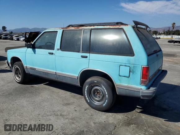 1991 GMC Jimmy z VIN 1GKCS13Z2M2518231, wystawiony jako Copart lot #64115274 z przebiegiem 132 698 mil mil oraz Czysty tytuł • Clean title. Historia ofert i sprzedaży dostępna na DreamBid. Obrazek 2.