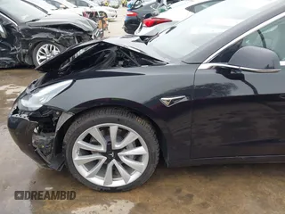 2018 Tesla Model 3 Long Range Battery with VIN 5YJ3E1EB3JF090567, listed as a IAAI auction lot 41568312 with 35,327 mi miles and . Bid and sale history available at DreamBid. Image 22.