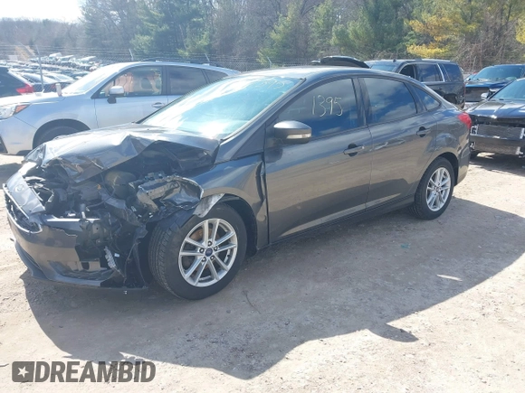 2018 Ford Focus SE with VIN 1FADP3F26JL249433, listed as a IAAI auction lot 41871395 with 131,357 mi miles. Bid and sale history available at carsss.com. Image 2.