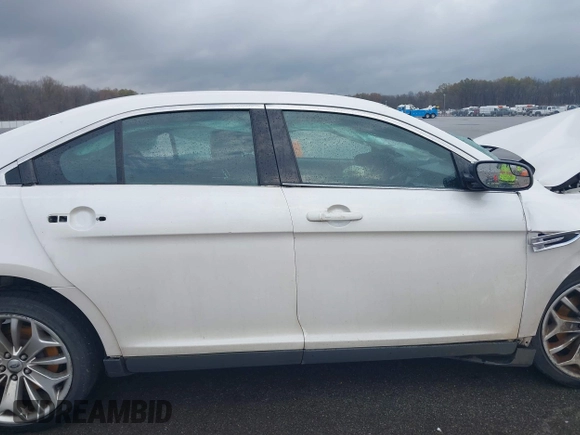 2014 Ford Taurus Limited with VIN 1FAHP2F80EG183153, listed as a IAAI auction lot 40860378 with 163,294 mi miles. Bid and sale history available at carsss.com. Image 14.