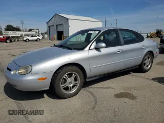 1996 Ford Taurus GL with VIN 1FALP52U7TA299996, listed as a Copart auction lot 53387685 with 175,029 mi miles and Salvage title. Bid and sale history available at DreamBid. Image 1.