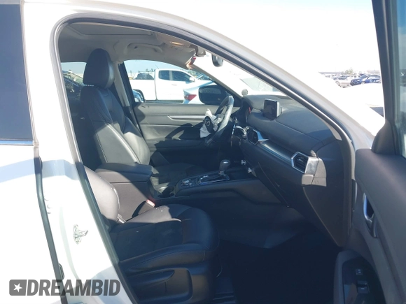 2019 Mazda CX-5 Touring with VIN JM3KFACM4K1668352, listed as a IAAI auction lot 41481291 with 65,901 mi miles and . Bid and sale history available at carsss.com. Image 5.