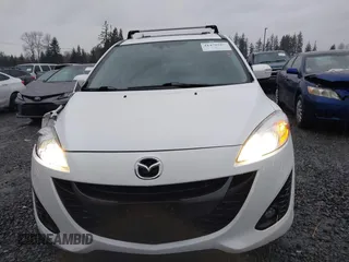 2015 Mazda Mazda5 Grand Touring with VIN JM1CW2DL6F0185594, listed as a IAAI auction lot 41470568 with 116,309 mi miles. Bid and sale history available at carsss.com. Image 12.