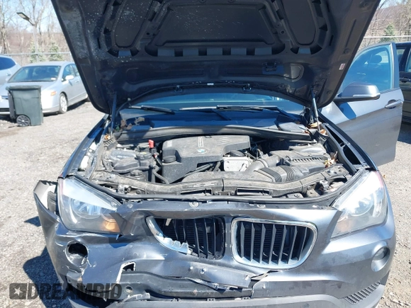 2015 BMW X1 xDrive28i with VIN WBAVL1C59FVY25442, listed as a IAAI auction lot 41854794 with 98,432 mi miles. Bid and sale history available at carsss.com. Image 10.