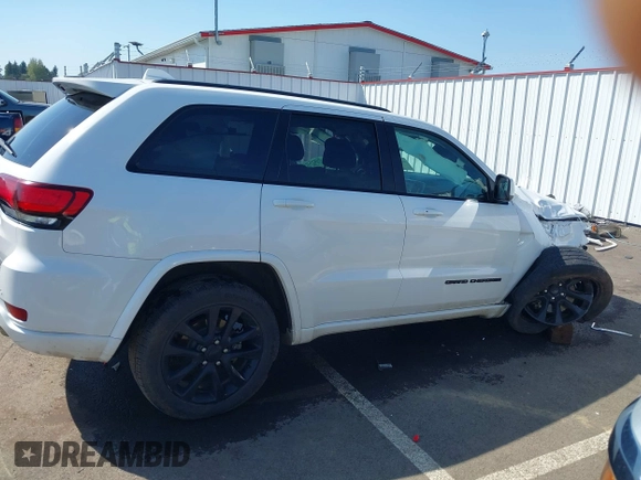2018 Jeep Grand Cherokee Altitude with VIN 1C4RJFAG0JC296947, listed as a IAAI auction lot 42034656 with 93,979 mi miles and . Bid and sale history available at DreamBid. Image 14.