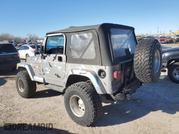 2001 Jeep Wrangler Sport with VIN 1J4FA49S21P346217, listed as a Copart auction lot 46133815 with 103,929 mi miles and Salvage Title. Bid and sale history available at carsss.com. Image 2.