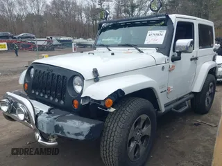2011 Jeep Wrangler Sahara with VIN 1J4AA5D15BL538240, listed as a IAAI auction lot 41793836 with 172,528 mi miles and . Bid and sale history available at carsss.com. Image 17.