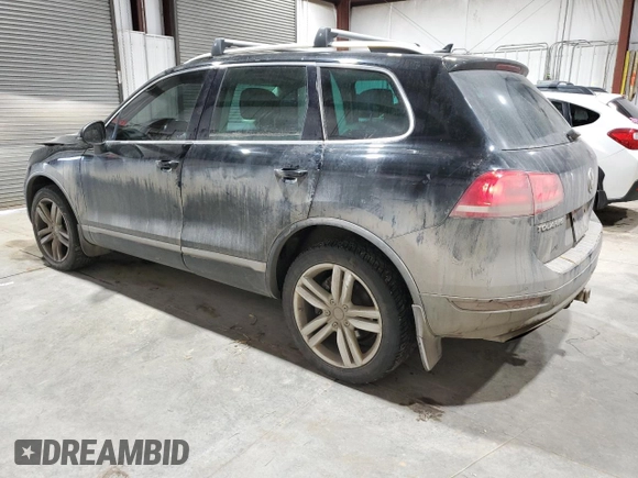 2011 Volkswagen Touareg Exec with VIN WVGFK9BP6BD006430, listed as a Copart auction lot 84288014 with 186,189 mi miles and Salvage Title. Bid and sale history available at DreamBid. Image 2.