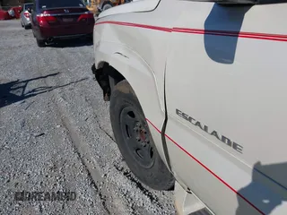 2004 Cadillac Escalade с VIN 1GYEC63TX4R299594, выставлен на аукционе IAAI как лот 41833184 с пробегом 320 822 миль миль и . История ставок и продаж доступна на DreamBid. Изображение 11.