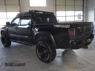2021 Toyota Tacoma SR z VIN 3TMCZ5AN3MM420851, wystawiony jako Copart lot #55668255 z przebiegiem 61 329 mil mil oraz Szkoda całkowita • Salvage title. Historia ofert i sprzedaży dostępna na DreamBid. Obrazek 4.