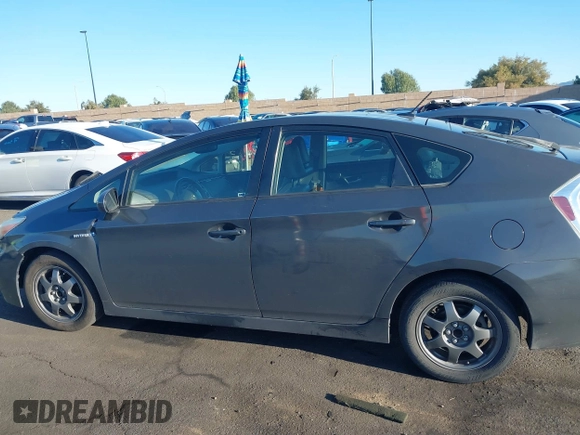 2012 Toyota Prius One with VIN JTDKN3DU1C1542800, listed as a IAAI auction lot 41840696 with 242,021 mi miles and . Bid and sale history available at DreamBid. Image 14.