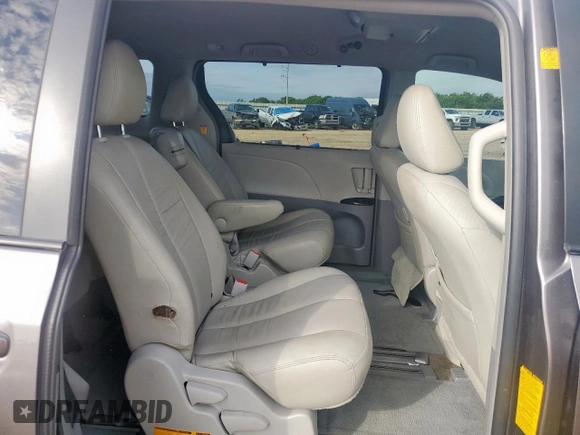 2011 Toyota Sienna LE AAS with VIN 5TDKK3DC7BS171627, listed as a Copart auction lot 64001605 with 130,748 mi miles and Salvage title. Bid and sale history available at DreamBid. Image 11.