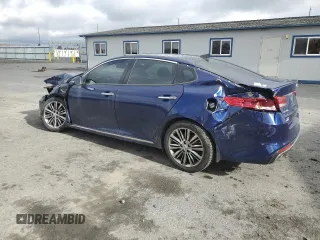 2018 Kia Optima SX with VIN 5XXGV4L25JG230508, listed as a Copart auction lot 56423135 with 100,575 mi miles and Salvage title. Bid and sale history available at DreamBid. Image 2.