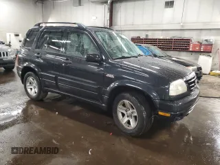2003 Suzuki Grand Vitara z VIN JS3TD62V234100175, wystawiony jako Copart lot #47174605 z przebiegiem 88 451 mil mil oraz Szkody całkowita. Historia ofert i sprzedaży dostępna na DreamBid. Obrazek 4.