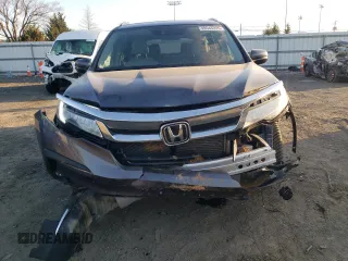 2020 Honda Pilot Touring 8-Passenger with VIN 5FNYF6H92LB031005, listed as a Copart auction lot 49545335 with 59,789 mi miles and Salvage Title. Bid and sale history available at DreamBid. Image 5.
