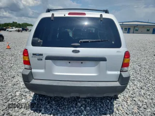 2003 Ford Escape XLT Popular with VIN 1FMYU03103KA06199, listed as a Copart auction lot 58731515 with 181,429 mi miles and Salvage title. Bid and sale history available at DreamBid. Image 6.