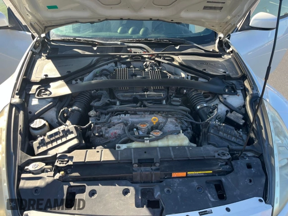 2012 Nissan 370Z Touring with VIN JN1AZ4FH4CM370351, listed as a Copart auction lot 77653994 with 98,326 mi miles and Salvage Title. Bid and sale history available at carsss.com. Image 7.