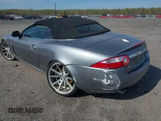 2007 Jaguar XK with VIN SAJWA44B075B11143, listed as a IAAI auction lot 42044257 with 122,842 mi miles. Bid and sale history available at carsss.com. Image 6.