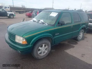 1999 Oldsmobile Bravada with VIN 1GHDT13W7X2711363, listed as a IAAI auction lot 41294782 with 198,508 mi miles. Bid and sale history available at carsss.com. Image 2.