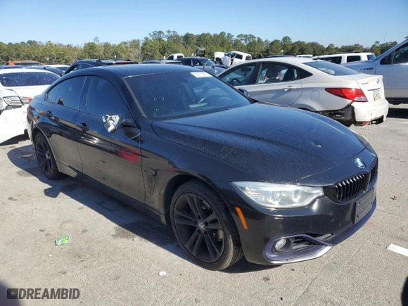 2015 BMW 4 Series 428i xDrive with VIN WBA4C9C51FD331771, listed as a Copart auction lot 82763504 with 124,945 mi miles and Salvage Title. Bid and sale history available at carsss.com. Image 4.