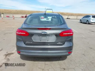 2018 Ford Focus SE z VIN 1FADP3F20JL327186, wystawiony jako IAAI lot #42271070 z przebiegiem 131 511 mil mil oraz . Historia ofert i sprzedaży dostępna na DreamBid. Obrazek 16.