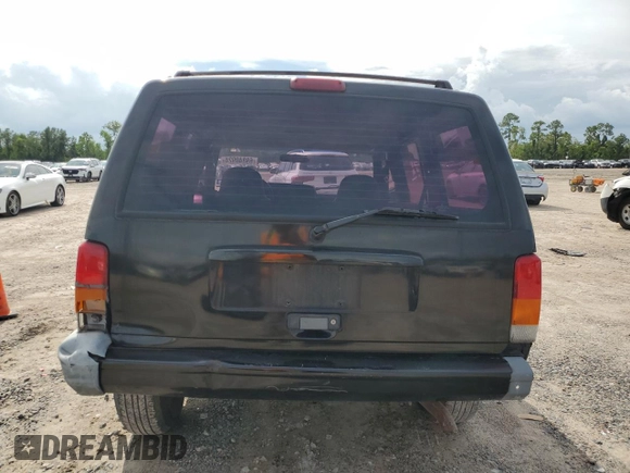2000 Jeep Cherokee with VIN 1J4FT48S3YL139915, listed as a Copart auction lot 69840924 with 249,720 mi miles and Salvage title. Bid and sale history available at DreamBid. Image 6.