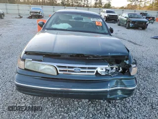 1996 Ford Crown Victoria LX z VIN 2FALP74W0TX205507, wystawiony jako Copart lot #85310874 z przebiegiem 51 646 mil mil oraz Szkoda całkowita • Salvage title. Historia ofert i sprzedaży dostępna na DreamBid. Obrazek 5.
