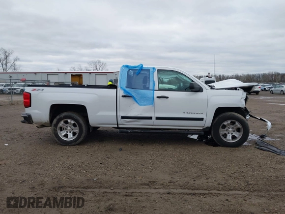 2014 Chevrolet Silverado 1500 LT with VIN 1GCVKREC2EZ390061, listed as a IAAI auction lot 40824477 with 140,928 mi miles and . Bid and sale history available at DreamBid. Image 13.