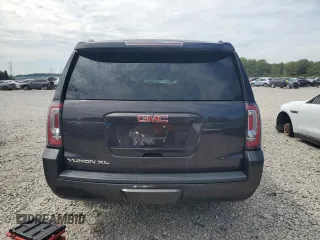 2015 GMC Yukon XL SLE z VIN 1GKS1GKC2FR625157, wystawiony jako Copart lot #69628124 z przebiegiem 153 022 mil mil oraz Szkoda całkowita • Salvage title. Historia ofert i sprzedaży dostępna na DreamBid. Obrazek 6.