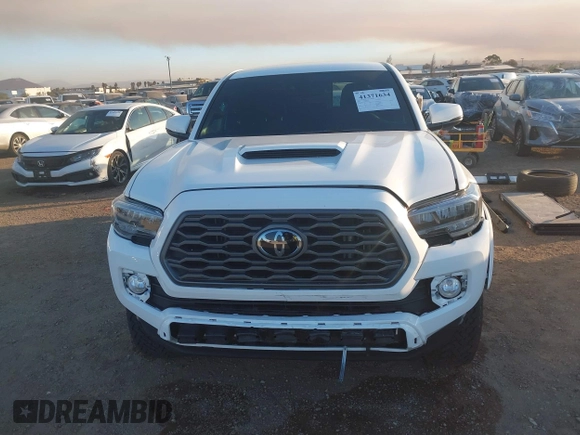 2023 Toyota Tacoma 4WD SR with VIN 3TMCZ5AN8PM647845, listed as a IAAI auction lot 41371634 with 21,917 mi miles. Bid and sale history available at carsss.com. Image 13.