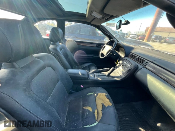 1995 Lexus SC 400 z VIN JT8UZ30CXS0041496, wystawiony jako Copart lot #80837114 z przebiegiem 62 010 mil mil oraz Tytuł czysty. Historia ofert i sprzedaży dostępna na DreamBid. Obrazek 5.