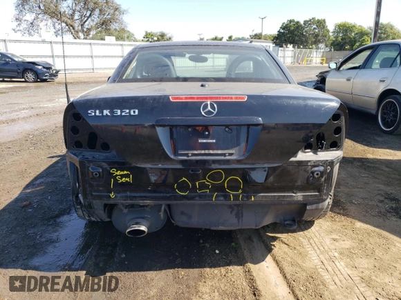 2002 Mercedes-Benz SLK-Class 3.2L with VIN WDBKK65F12F254172, listed as a Copart auction lot 74336334 with 148,405 mi miles and Salvage Title. Bid and sale history available at carsss.com. Image 6.