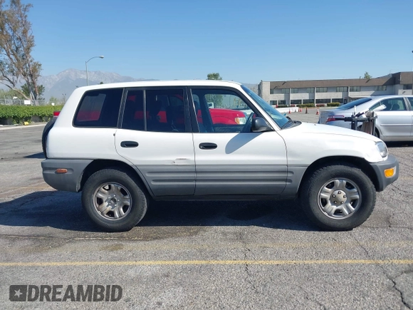 1999 Toyota RAV4 with VIN JT3GP10V2X7064915, listed as a IAAI auction lot 41998544 with 302,351 mi miles and . Bid and sale history available at DreamBid. Image 13.