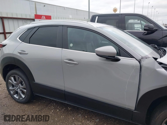 2025 Mazda CX-30 S Preferred with VIN 3MVDMBCM7SM771411, listed as a IAAI auction lot 41290560 with 4 mi miles and . Bid and sale history available at DreamBid. Image 14.