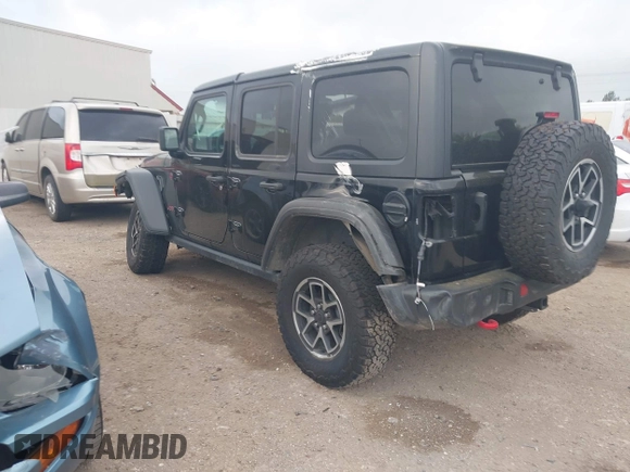 2024 Jeep Wrangler Rubicon with VIN 1C4PJXFG6RW337596, listed as a IAAI auction lot 41958788 with 15,942 mi miles and . Bid and sale history available at DreamBid. Image 3.