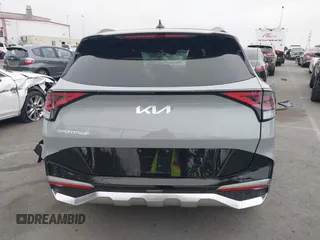 2025 Kia Sportage SX-Prestige z VIN 5XYK53DF4SG253958, wystawiony jako IAAI lot #41839577 z przebiegiem 8 205 mil mil oraz . Historia ofert i sprzedaży dostępna na DreamBid. Obrazek 17.