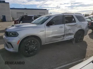 2023 Dodge Durango R/T Plus z VIN 1C4SDHCTXPC685988, wystawiony jako Copart lot #87110694 z przebiegiem 15 216 mil mil oraz Szkoda całkowita • Salvage title. Historia ofert i sprzedaży dostępna na DreamBid. Obrazek 1.