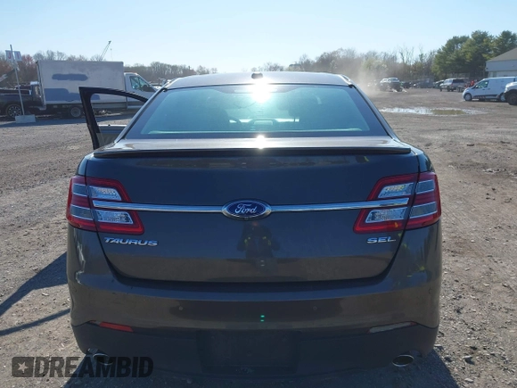 2015 Ford Taurus SEL with VIN 1FAHP2E83FG206055, listed as a IAAI auction lot 41943670 with 90,808 mi miles and . Bid and sale history available at carsss.com. Image 16.