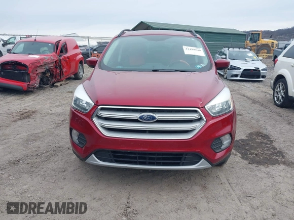 2018 Ford Escape SE z VIN 1FMCU9GD6JUA18684, wystawiony jako IAAI lot #41499540 z przebiegiem 105 127 mil mil oraz . Historia ofert i sprzedaży dostępna na DreamBid. Obrazek 12.