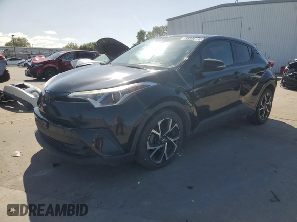 2018 Toyota C-HR XLE with VIN NMTKHMBX9JR022143, listed as a Copart auction lot 51127885 with 96,415 mi miles and Clean Title. Bid and sale history available at carsss.com. Image 1.